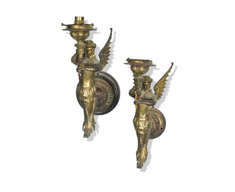 A pair of small gilt metal Victorian wall light brackets, modelled as winged figures32cm highProvenance:Wood Hall, Hilgay, No