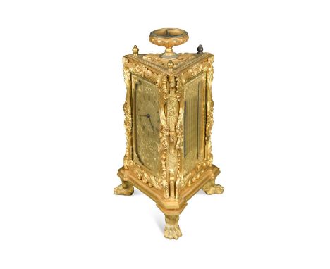 An ormolu case mantel timepiece, 19th century, in the manner of Thomas Cole, of unusual triangular shape, with compass finial