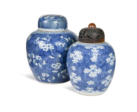 A Chinese blue and white export porcelain ginger jar and cover, Qing Dynasty 18th century, decorated in prunus and crackled i