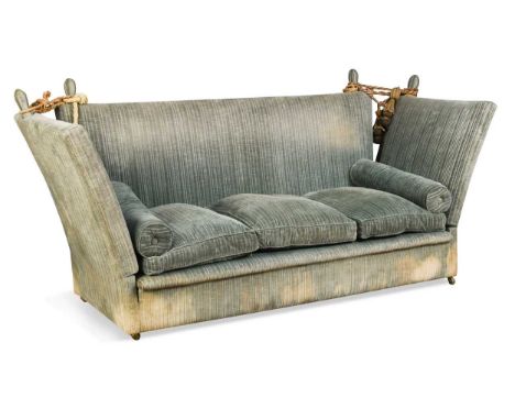 A three-seater Knole sofa, 20th century, the rectangular back and drop-sides surmounted by finials upholstered in a light blu