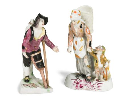 A continental porcelain figurine of a beggar, circa 1790, 14.5cm high; amother of a mother carrying a basket on a her back wi