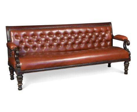 A Regency style mahogany and leather hall bench, 19th century, the rectangular back with buttoned leather upholstery over dow
