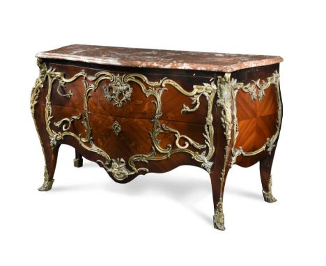 A Louis XV style gilt mounted marquetry commode, early 20th century, the shaped variegated red marble top with moulded edge o
