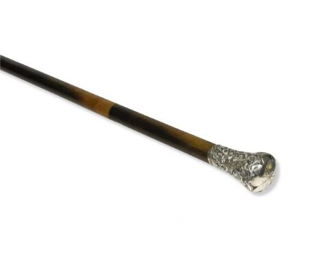 A rhinoceros horn walking stick with silver pommel, circa 1890, tapered to a white metal tip 89.5cm overall, 490g grossgood c