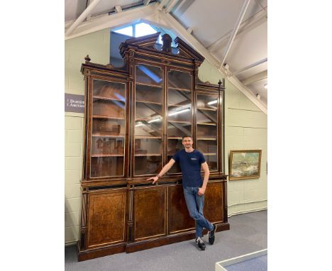 * Bookcase. A substantial Regency revival "exhibition standard" walnut and ebonised giltwood breakfront bookcase circa 1860, 
