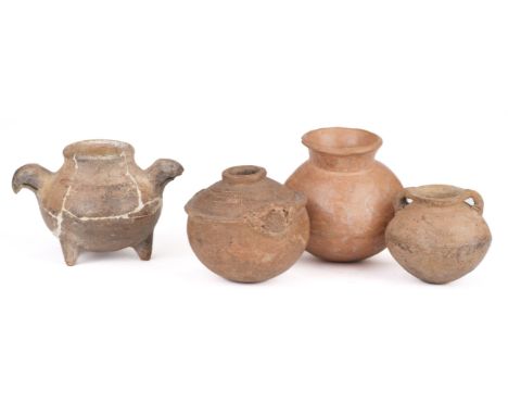 * Pre-Columbian. A small collection of pre-columbian terracotta pots, including an ovoid pot with a rope twist moulded decora