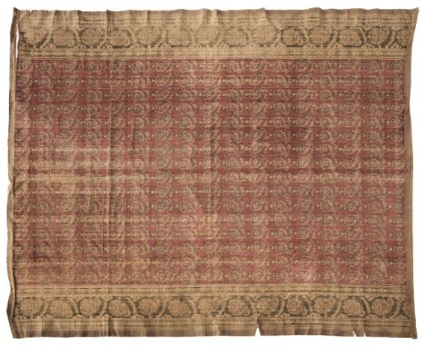* Persia. A velvet ikat panel, 19th century, woven with pattern of green and cream botehs on a red ground, with wide border o