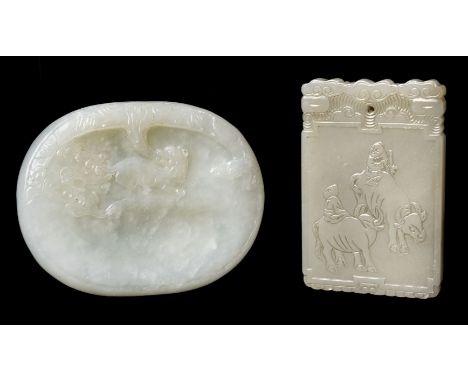 * Jade. A large Chinese white jade panel, carved with a cub, otherwise plain, 8 cm long, together with a Chinese jade pei, on