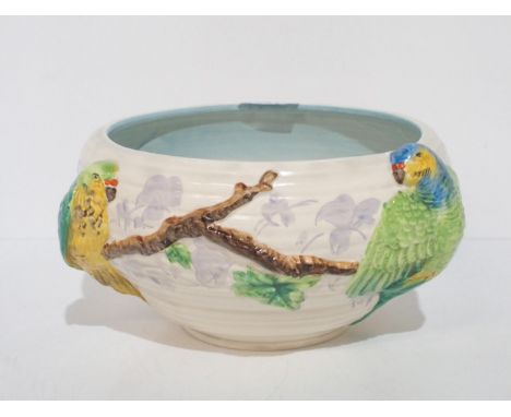 A Clarice Cliff moulded parrot bowl Condition Report:Available upon request