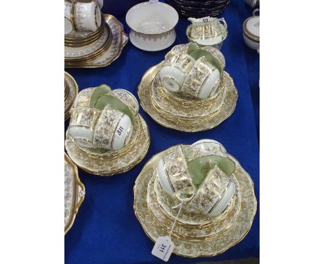 A Hammersley teaset, the green ground with gilt decoration, pattern number 4605 Condition Report:Available upon request
