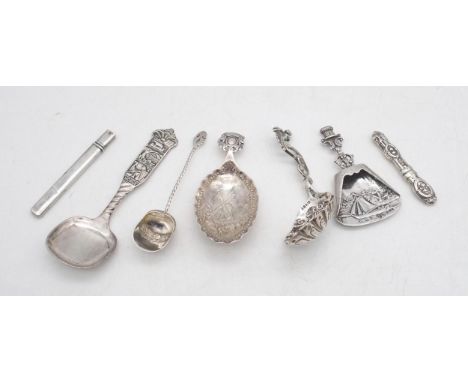 A collection of mainly continental silver, including a Dutch silver caddy spoon, with a perforated shell form bowl, and a roc