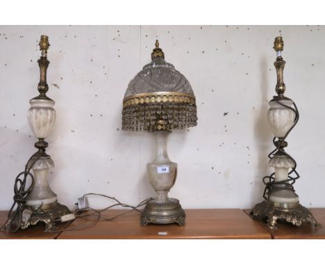 A pair of 20th century brass and marble baluster form table lamps and another brass and marble table lamp with cut glass shad