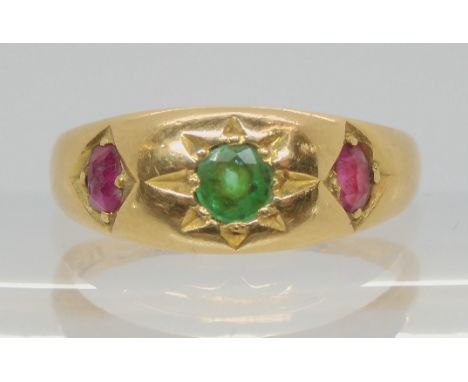 An 18ct gold emerald and ruby ring, size Q, weight 5.7gms Condition Report:Available upon request