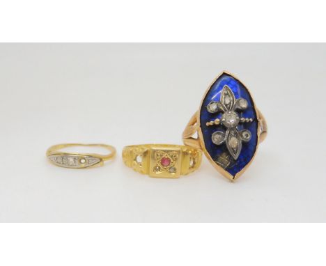 An 18ct gold red gem ring, and a vintage three stone (both have diamonds missing) together with a yellow metal ring set with 