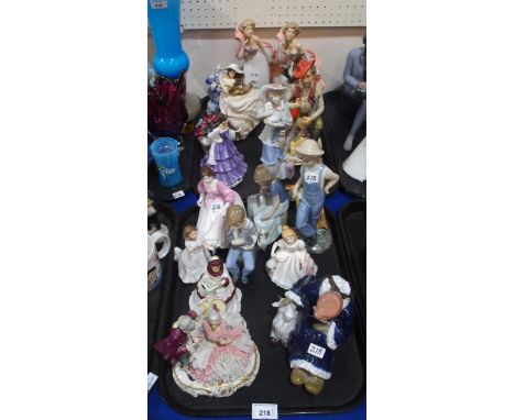 A collection of figures including Royal Doulton, Nao, Dresden and others Condition Report:No condition report available.