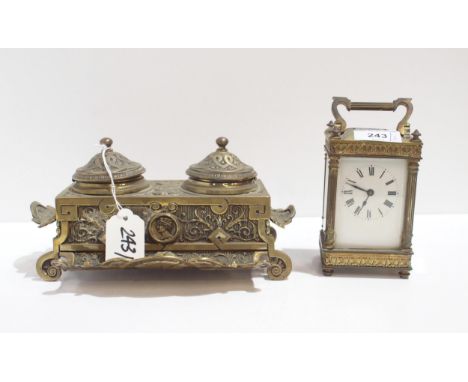 A brass and glass carriage clock together with a brass inkwell Condition Report:Available upon request