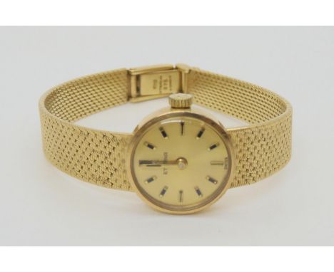 A 9ct gold Eterna watch with integral strap, weight including mechanism 20.5gms Condition Report:Available upon request
