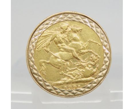 An 1891 gold full sovereign in a 9ct gold ring mount, size V, weight 13.8gms Condition Report:Available upon request