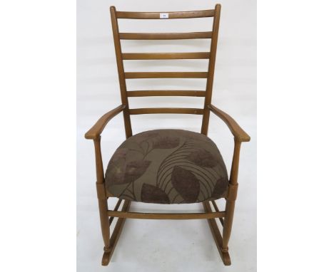A mid 20th century Scandinavian style ladder back rocking chair, 92cm high x 51cm wide x 75cm deep&nbsp; Condition Report:Ava