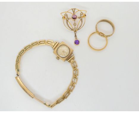 An 18ct gold wedding ring, weight 3.2gms. 9ct gold Edwardian pendant set with amethyst and pearl, a 9ct gold wedding ring and