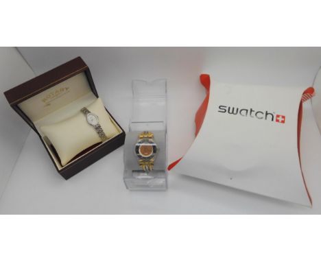 A Swatch watch with three coloured golden strap and mirrored dial in original packaging, together with a boxed ladies Rotary 
