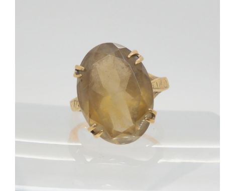 A 9ct gold smoky quartz ring, size N, weight 5.2gms Condition Report:Available upon request