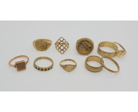 Three 9ct gold wedding bands, a faux coin ring and six further 9ct rings, weight combined 26.8gms Condition Report:Available 