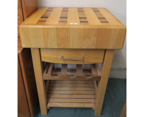 A 20th century kitchen butcher block island with butcher block top over single drawer over wine shelf over bottom tier, 83cm 