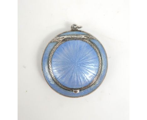 A RUSSIAN SILVER GUILLOCHE ENAMEL COMPACT of circular form, with cornflower blue enamel decoration, the interior lid inset wi