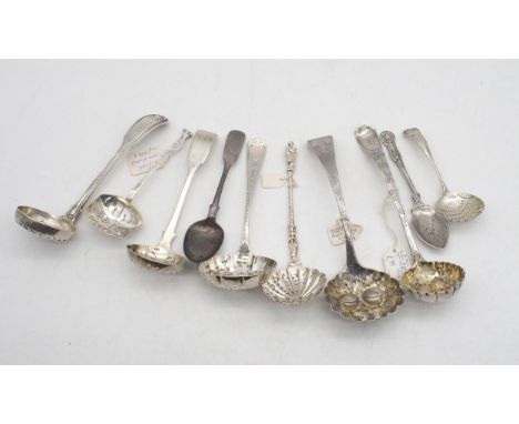 A collection of mainly sifter spoons, including a George III Old English example, with berried bowl, by Thomas Wallis &amp; J