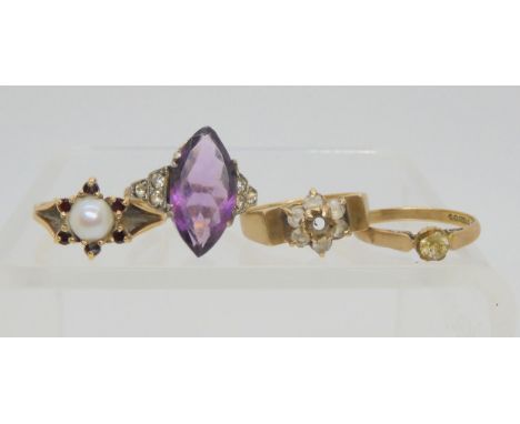 Four 9ct gold gem set rings to include a garnet &amp; pearl flower ring, weight together 9.7gms Condition Report:Available up