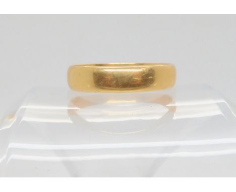 A bright yellow metal wedding ring, Gents size 3, weight 6.8gms Condition Report:Available upon request