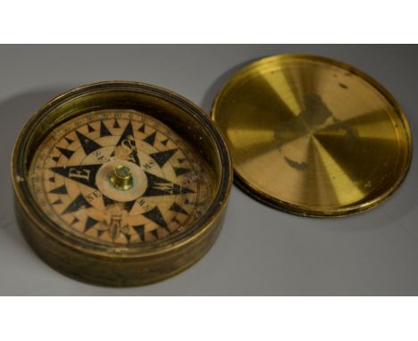 A 19th century lacquered brass travelling compass, screw-fitting cover, 6cm diam