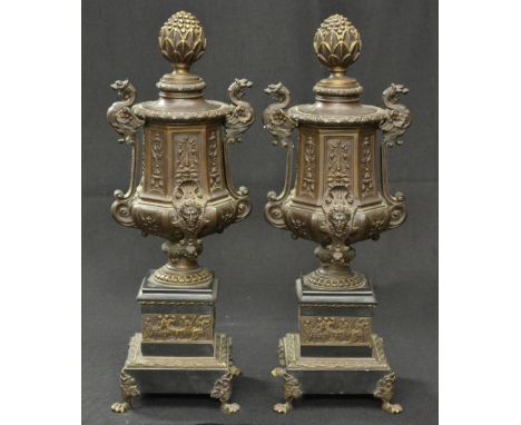 A pair of 19th century French dark patinated bronze urns, bud finials, dragon-capped handles, cast in the Renaissance taste w