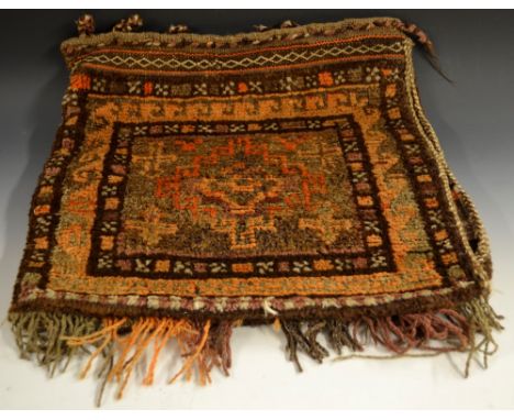 Middle Eastern Textiles - a Balouch woollen salt bag, worked in tones of orange and brown with geometric bands, 49cm x 48cm f