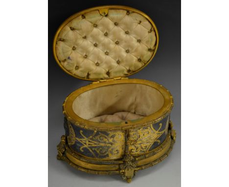 A French gilt metal oval jewellery box, applied with silvered portrait boss surrounded by gilt meal anthemions and scrolls, s