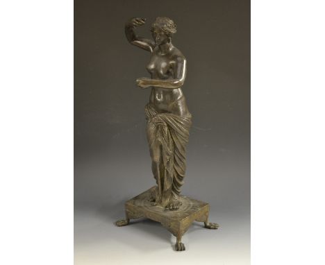 Grand Tour School (19th century), a patinated bronze, Venus, naked to waist, outstretched arms, her hair pulled back and knot