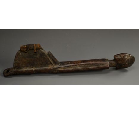 Tribal Art - an African figural votive or implement, of phallic design, 24cm long 