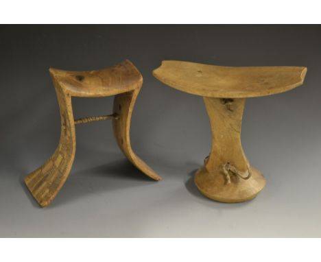 Tribal Art - a Karamojong headrest, of splayed Y-shaped form, dished top, the sides carved with chequered panels, twisted hid