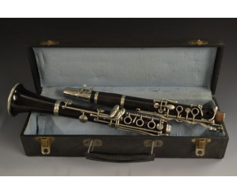 A rosewood clarinet, by G. Prueffer, nickel plated keys and mounts, no. 20090 2, 66cm long overall, cased 
