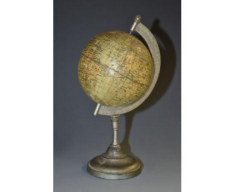 A French desk globe, of small proportions, the Sphere Terrestre, by N K Atlas, Paris, cast alloy stand, 18cm high   Condition