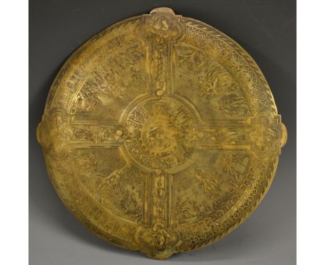 A late Victorian Revivalist bronze shield, the centre boss decorated with a king placing a ring on a maiden's finger, the fou