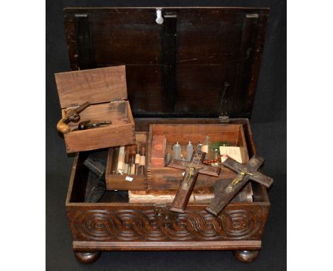 A composed vampire hunter's killing kit, comprising mallet, cross-shaped and other stakes, late 18th century tree calf folio 