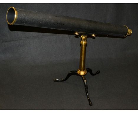 An early 20th century lacquered brass and black painted 3 inch refractor telescope, by Broadhurst Clarkson & Co, London, rack