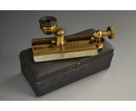 Drapery - an early 20th century brass cloth measure, by J. Casartelli & Son, Manchester, adjustable eyepiece, screw-thread me