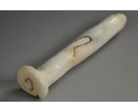 Tribal Art - a Polynesian plug-shaped ear ornament, fashioned from a sea shell, 8cm long