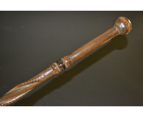 Tribal Art - a Zulu hardwood prestige or status staff, globular pommel, the shaft carved with entwined snakes, 142cm long, la