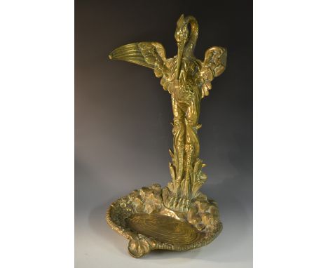 A French Art Nouveau umbrella stand, the whole centred by a heron with incurved flapping wings, stood before a pool recess, t