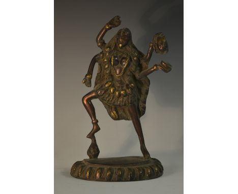 Indian School (19th century), a bronze shrine figure, of a deity, lotus base, 23.5cm high