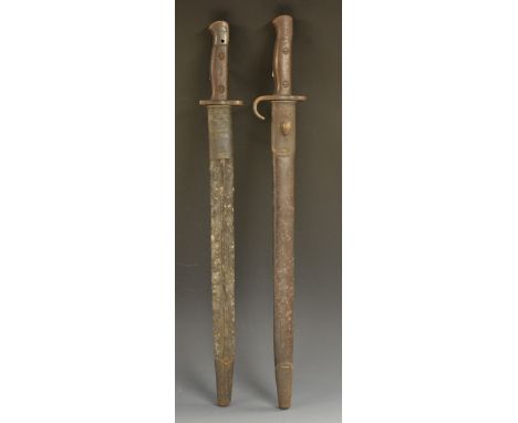 A 1907 pattern bayonet, 43cm straight fullered blade by Sanderson, two-piece wooden grip, steel and leather scabbard, 58cm lo